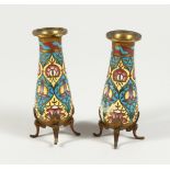 A SMALL PAIR OF CHAMPLEVE ENAMEL VASES 4ins high