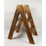 A SET OF NOVELTY ADVERTISING PINE STEPS. 2ft 10ins high