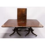 A GOOD GEORGE IV PERIOD MAHOGANY TWIN PILLAR DINING TABLE, comprising a pair of tilt top ends with