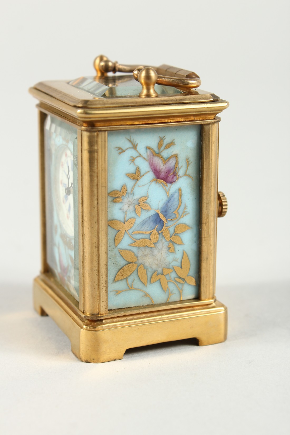 A MINIATURE SEVRES CARRIAGE CLOCK with flora porcelain panels. 2.25ins high. - Image 2 of 7