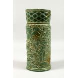 A LARGE CHINESE CARVED BAMBOO JADE VASE, carved with foliage and fences.