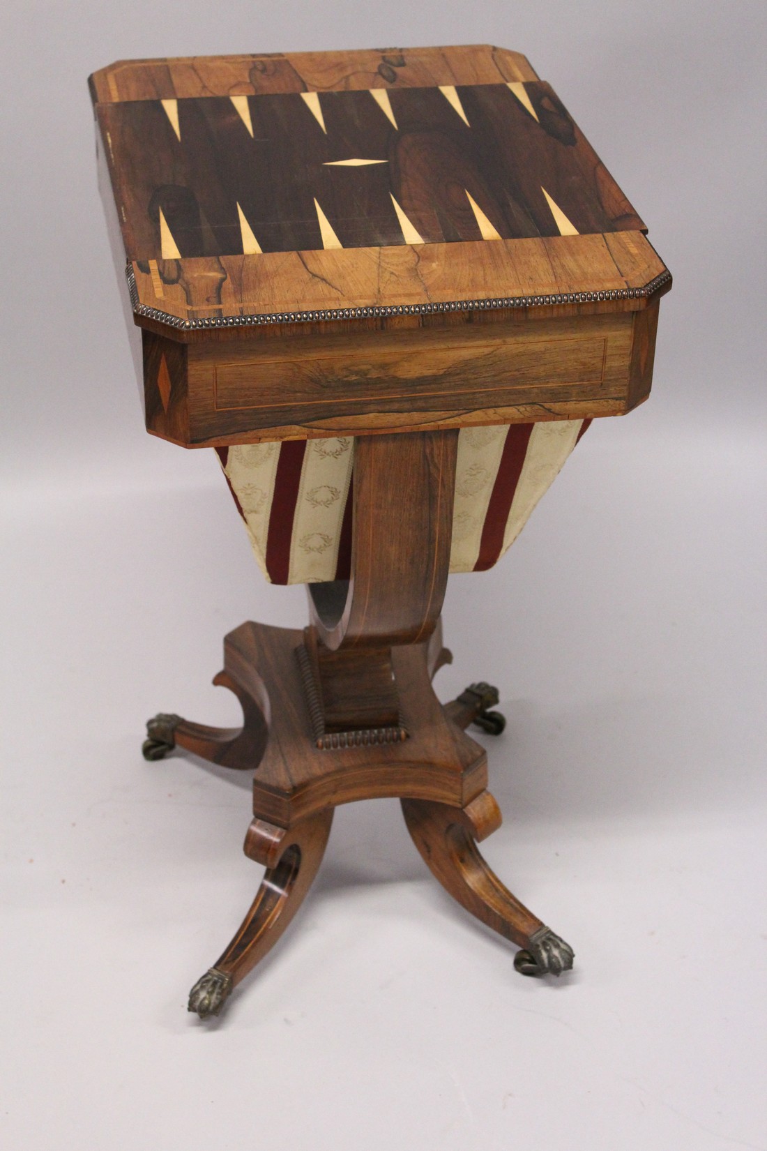 A REGENCY ROSEWOOD SEWING TABLE, with reversible Backgammon top , sliding drawer and sewing bag on - Image 6 of 9