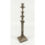 A LARGE VICTORIAN CORINTHIAN COLUMN LAMP on a square base. 23ins high.