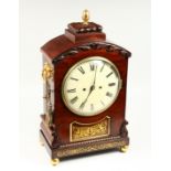 A GOOD RENGENCY ROSEWOOD BRACKET CLOCK with brass inlay acorn final, circular dial, 8 day