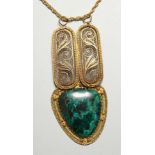 A FILIGREE AND MALACHITE PENDANT