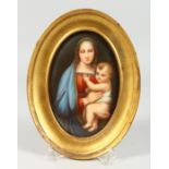 A GOOD OVAL PORCELAIN PLAQUE Madonna and child, in a gilt frame. 6 x 4 ins.