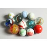 A COLLECTION OF TWELVE COLOURED MARBLES 2cm