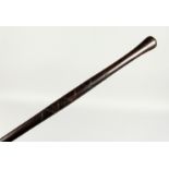 A HARDWOOD CANE 36ins long.