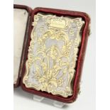 A VICTORIAN SILVER AND SILVER GILT CALLING CARD CASE Biimingham 1857, maker A.T., in a fitted case.
