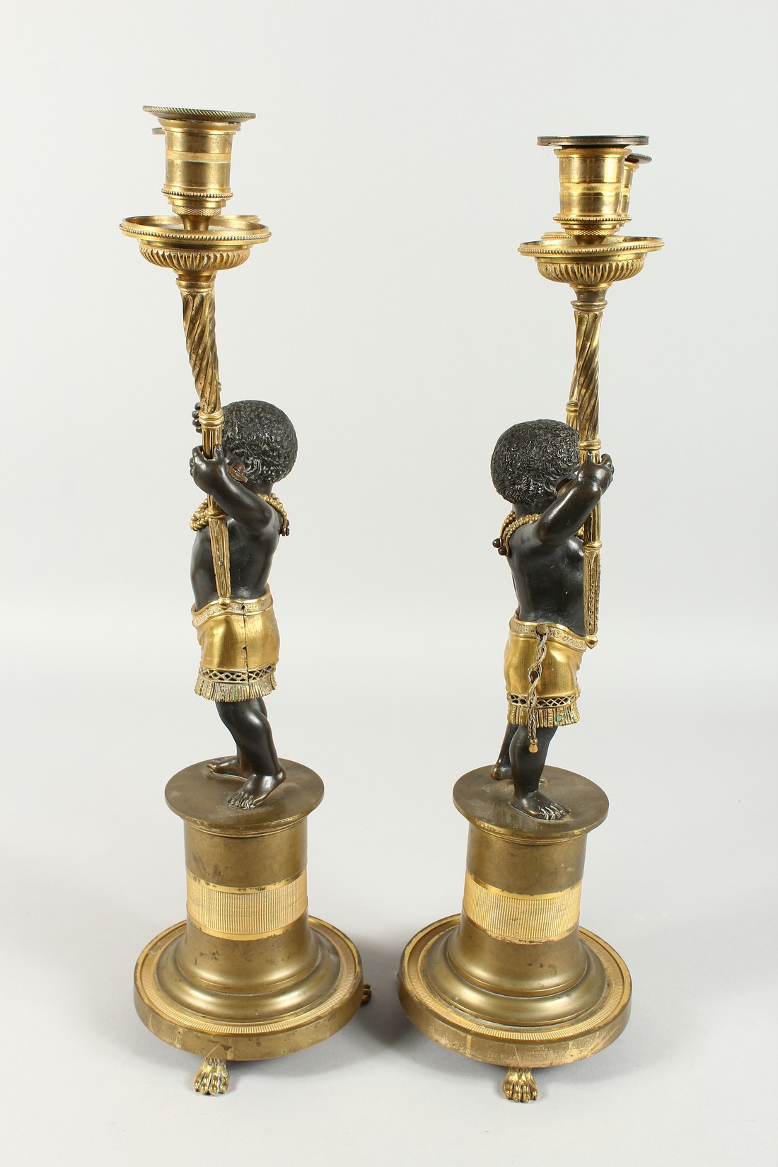 A SUPERB PAIR OF EMPIRE BRONZE AND GILT BRONZE TWO BRANCH CANDLESTICKS of nubian children holding - Image 9 of 9