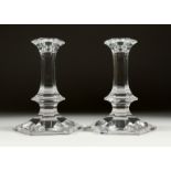 A PAIR OF VAL ST. LAMBERT OCTAGONAL GLASS CANDLESTICKS 6ins high.