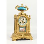 A GOOD LOUIS XVITH DESIGN GILT SEVRES AND PORCELAIN CLOCK with urn final, column supports and Sevres