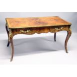 A GOOD LOUIS XVI STYLE FIGURES WALNUT BUREAU PLAT, with cross banded top , ormolu mounts , two freze