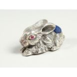 A LARGE SILVER RABBIT PIN CUSHION