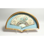 AN 18TH CENTURY FRENCH IVORY AND PAPER FAN, with young lovers and portraits . 17ins open, in a