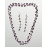 A SILVER FACET CUT AMETHYST LONG CHAIN AND EAR RINGS