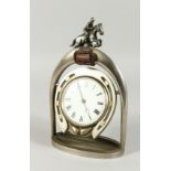 A GOOD EQUESTRIAN CLOCK ON A HORSE SHOE in a stirrup. 10.5ins high