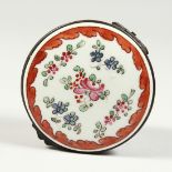 A FRENCH PORCELAIN CIRCULAR BOX 2.5ins diameter.