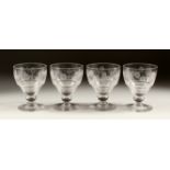 A SET OF FOUR GOBLETS engraved with hops.