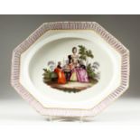 A GOOD BERLIN OCTAGONAL DISH with pierced border, the centre painted with ladies in a garden