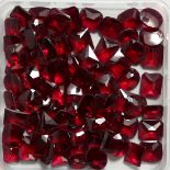 A BOX OF BUFF RED STONES