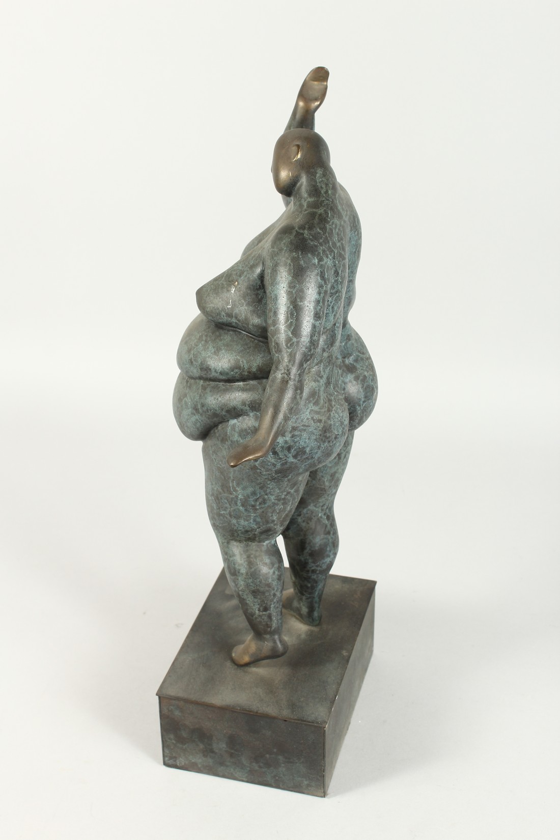 AN ABSTRACT BRONZE STANDING FAT NUDE on a bronze base, 18ins high. - Image 2 of 3