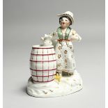 A ROCKINGHAM PORCELAIN QUILL HOLDER, young girl standing beside a barrel. 5ins high.