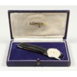 A GENTLEMAN'S LONGINES WRIST WATCH in an original box.