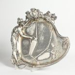 AN ART NOUVEAU PLATED DISH, classical young lady with jug and fruiting vines. 11ins.