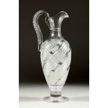 A VICTORIAN STEVENS & WILLIAMS CUT GLASS EWER 12ins high.