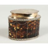 A FAUX-TORTOISESHELL OVAL TEA CADDY with plated mounts. 4" wide