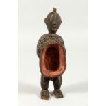 AN ANCIENT TRIBAL CARVED WOOD FIGURE 9ins high