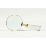 A MAGNIFYING GLASS WITH CUT GLASS HANDLE