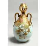 A GOOD M. REDON, LIMOGES TWO HANDLED VASE, with flowers and birds in gilt. Circular printed mark no.