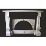 A GOOD CARVED MARBLE FIREPLACE, with broad mantle supported on a pair of classical columns, a carved