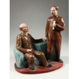 A RUSSIAN PORCELAIN GROUP OF LENIN AND a Chinese general holding a pipe, one standing the other