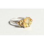 A SILVER AND CITRINE RING