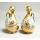 A GOOD PAIR OF M. REDON, LIMOGES SINGLE HANDLED BULBOUS VASES, gilt and blue ground painted with