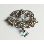 AN EDWARDIAN, 9CT. GOLD, DIAMOND, PEARL AND TOPAZ BROOCH