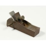 A MINIATURE BRONZE PLANE 3.25ins long