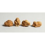 A SET OF FOUR CARVED BONE NETSUKE