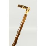 A VICTORIAN BONE HANDLED WALKING STICK, with blackthorn handle.