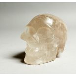 A ROCK CRYSTAL SKULL 4ins high