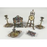 A FRENCH CHAMPLEVE ENAMEL SIX PIECE DESK SET, comprising clock, inkstand, pair of sticks, blotter