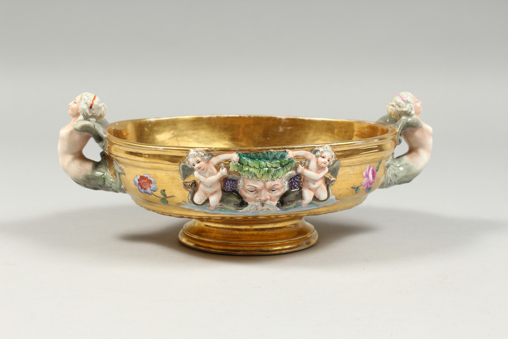 A GOOD BERLIN GILT GROUND OVAL BOWL with mermaid handles, masks and flowers. 8.5ins long - Image 4 of 8
