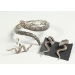 A SILVER AND MARCHASITE SNAKE BRACELET, RING AND EAR RINGS.