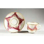 A WORCESTER RARE TEACUP AND SAUCER, the cup with entwined handle painted in the Sormont pattern.