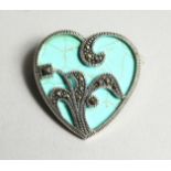 A TURQUOISE HEART SHAPED BROOCH