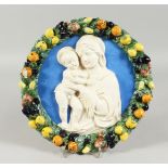 A DULA ROBIN ITALIAN CIRCULAR POTTERY MADONNA CHARGER 12ins diameter.