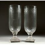 A GOOD PAIR OF CUT GLASS STORM LANTERNS.